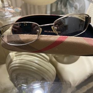 Burberry reading glasses pre owned. Made in Italy.